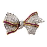 White and yellow gold pave set diamond and calibre cut ruby bow brooch,