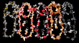 Five sets of necklaces and bracelets, including coral, pearls and hard stones,