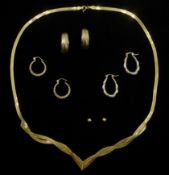 Gold flattened snake chain necklace, three pairs gold hoop earrings and a pair of stud earrings,