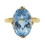 Gold single stone oval aquamarine ring, stamped 18c Condition Report Approx 3.