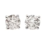 Pair of 18ct white gold diamond stud earrings, stamped 750, diamond total weight 1.
