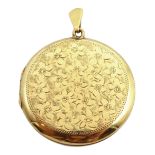9ct gold circular locket, with engraved decoration hallmarked,