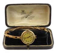 Early 20th century 9ct gold ladies manual wind wristwatch, case by Stockwell & Co,