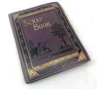 Victorian scrap album dated 1899 with thirty-two fully stocked leaves including scraps,