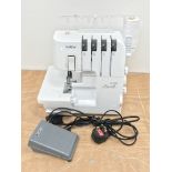 Brother 3034D overlocker sewing machine with pedal Condition Report <a
