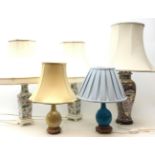 Collection of 20th century Chinese and Oriental style table lamps including a pair of square