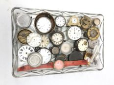 Tray of Assorted pocket watch movements, mostly with white enamel dials,