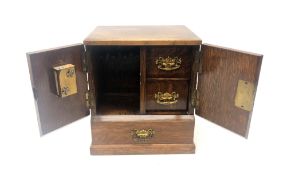 Edwardian oak smokers cabinet with brass fittings and fitted interior H30cm Condition