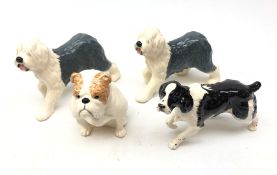 Four John Beswick boxed Dogs comprising two Old English Sheepdogs,