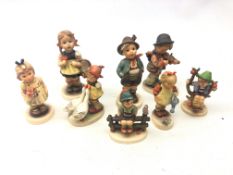 Eight Goebel figures including Brother Boy no. 95, Sister no.