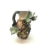 Studio pottery vase with raised entwined dragon decoration amongst foliage, impressed seal S.