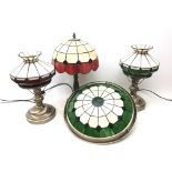 Pair brushed metal table lamps with Tiffany style red and green shades,