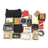 Collection of assorted vintage powder compacts including Musical compacts by Clover, Dandy-Mate,