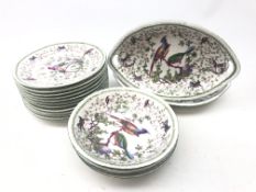 Continental dessert service decorated with exotic birds amongst trailing foliage comprising twelve