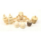 Two pairs of early 20th century ivory salt & pepper shakers,