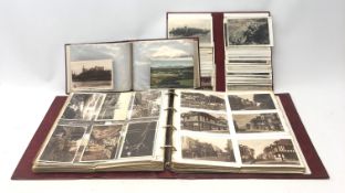 Modern album containing over three hundred Edwardian and later postcards,