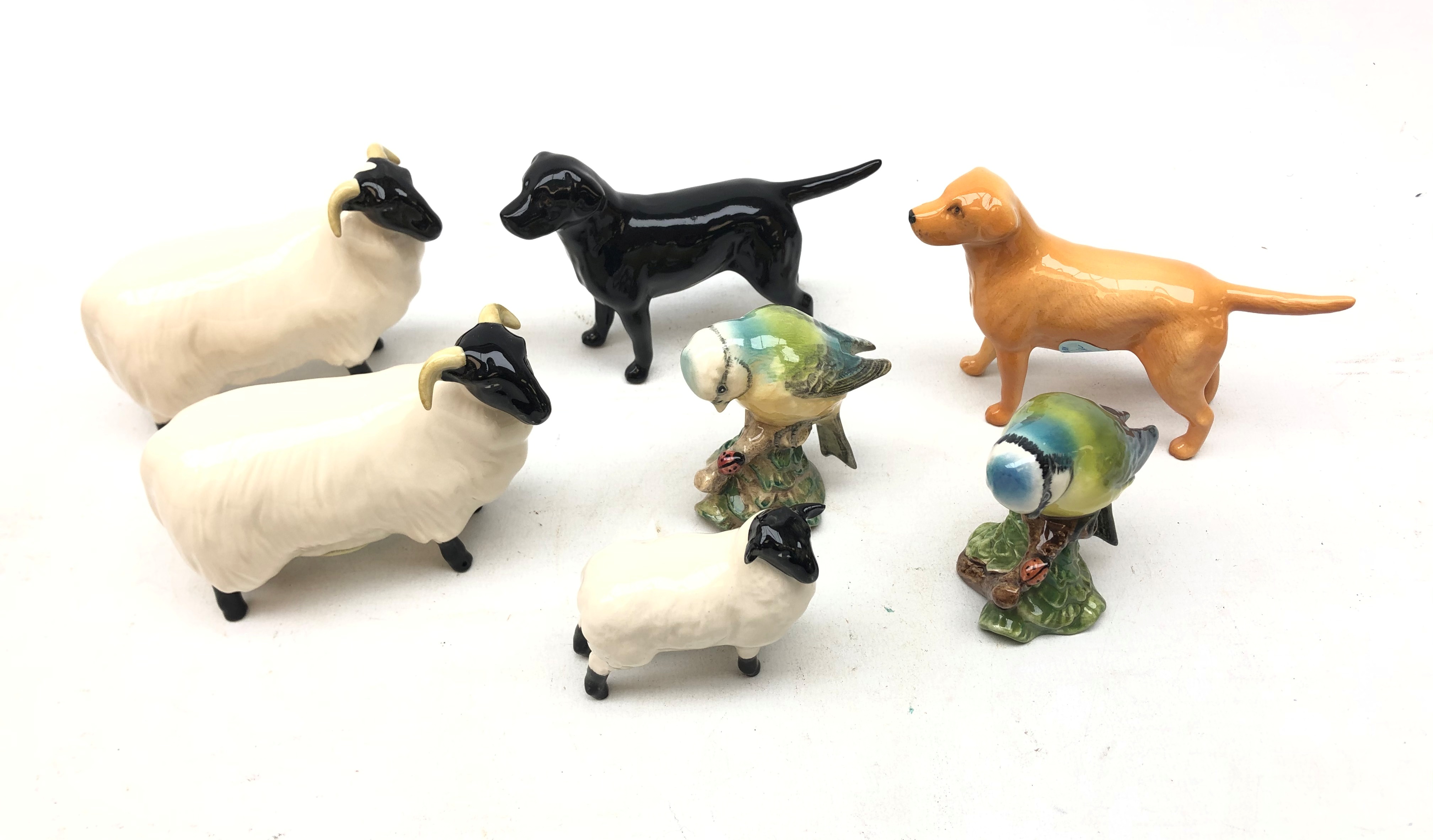 Collection of John Beswick boxed animals comprising a Golden Labrador, Black Labrador, two Rams,