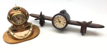 Copper and brass divers helmet clock on oblong oak plinth H20cm and another in the form of an