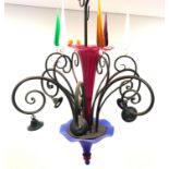 Large 20th century wrought iron and glass six light chandelier, magenta glass trumpet column,