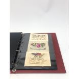 Modern loose leaf album containing over fifty WW1 silk postcards including Regimental crests,