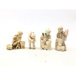 Group of four Japanese Meiji ivory Okimonos carved as crafts men,
