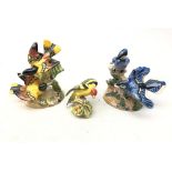 Two Beswick Bird Groups comprising American Blue Jays no. 925 Baltimore Oriole no.