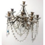 Early 20th century gilt metal eight branch wall light with neoclassical design glass sconces and