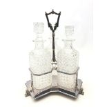 Late Victorian silver plated decanter stand of trefoil form, each with square section receptacles,