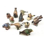 Eleven Royal Worcester, Beswick and Aynsley matt glazed birds including a Blue Tit, Greenfinch,