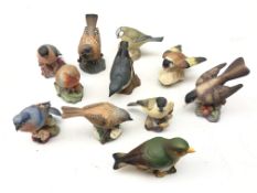 Eleven Royal Worcester, Beswick and Aynsley matt glazed birds including a Blue Tit, Greenfinch,