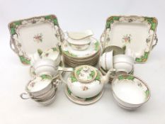 1920s Royal Stafford Knemare pattern tea set comprising ten cups, twelve saucers, teapot and stand,