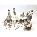 Lladro model of a seated Ballet dancer, another seated on a chair and six Nao Ballet dancers,