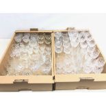 Nine Thomas Webb crystal wine glasses, six Tyrone crystal tumblers, eight small wine glasses,