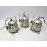 Three aluminium theatre stage lamps,