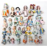 Collection of thirty ceramic pin cushion/ half dolls of varying size H12cm max Condition