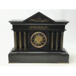 Victorian polished black slate mantel clock, Temple shaped case with brass frieze and columns,