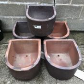 Five medium 'D' shaped rustic frost proof pots, W42cm, H26cm,