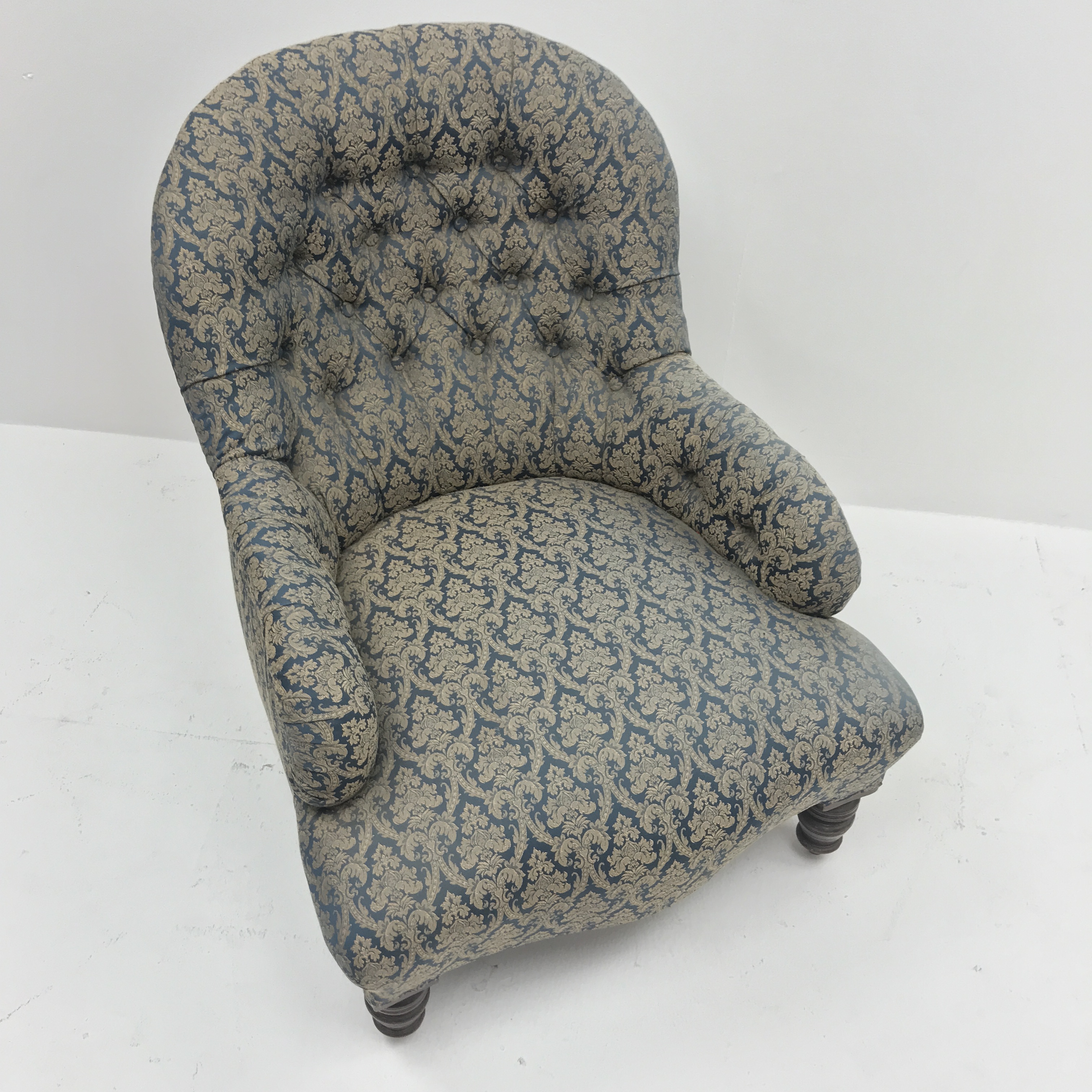 Victorian spoon back armchair, upholstered in a deep buttoned patterned fabric, turned supports, - Image 3 of 3