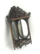 20th century mahogany wall hanging corner shelf fitted with two oval mirrors, W45cm, H83cm,