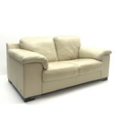 Violino two seat sofa upholstered in cream leather,