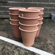 Twelve stackable circular tapering frost proof terracotta plant pots, D40cm,