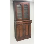 Victorian mahogany bookcase on cupboard, two lead glazed doors, single frieze drawer,