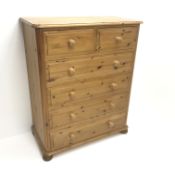 Solid pine chest, two short and four long drawers, bun feet, W91cm, H111cm,