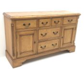 Solid pine dresser, six drawers, two cupboards, shaped plinth base, W153cm, H92cm,