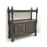 Victorian heavily carved two tier oak buffet, removable top tier on barley twist supports,