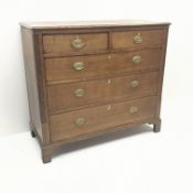 Georgian oak chest, reeded columns flanking two short and three long drawers, bracket supports,