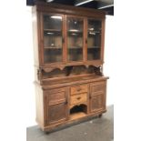 19th century pine bookcase on cupboard, projecting cornice,