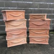 Seven rectangular terracotta pots with Adams style swags (W62cm, H25cm,
