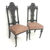 Pair Victorian heavily carved oak hall chairs, upholstered seat, turned and reeded supports,
