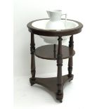 Early 19th century circular mahogany two tier washstand with ceramic bowl and jug,